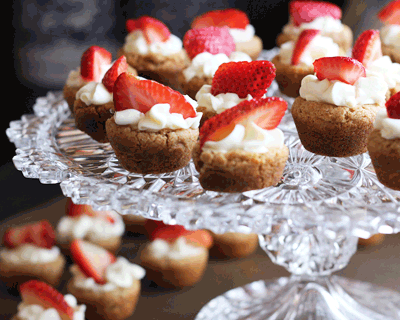 Almond biscuits with cream and strawberry on top