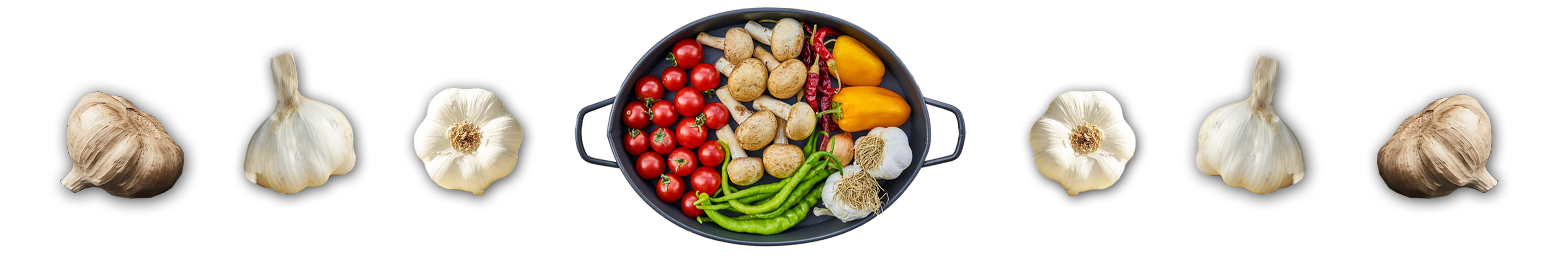 Buntes Gemüse in einem Topf und Knoblauchzehen