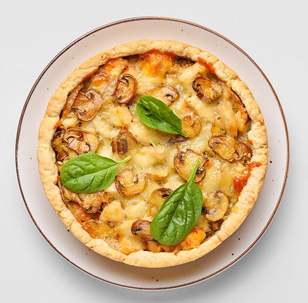 Quiche mit Pilzen und Blattspinat