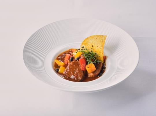 Uruguay - Tuco (Rindfleisch) mit schwarzen Bohnen, Taccocrunch