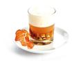 Pilz-Cappuccino-Suppe mit Milchschaum und Tiroler Speck